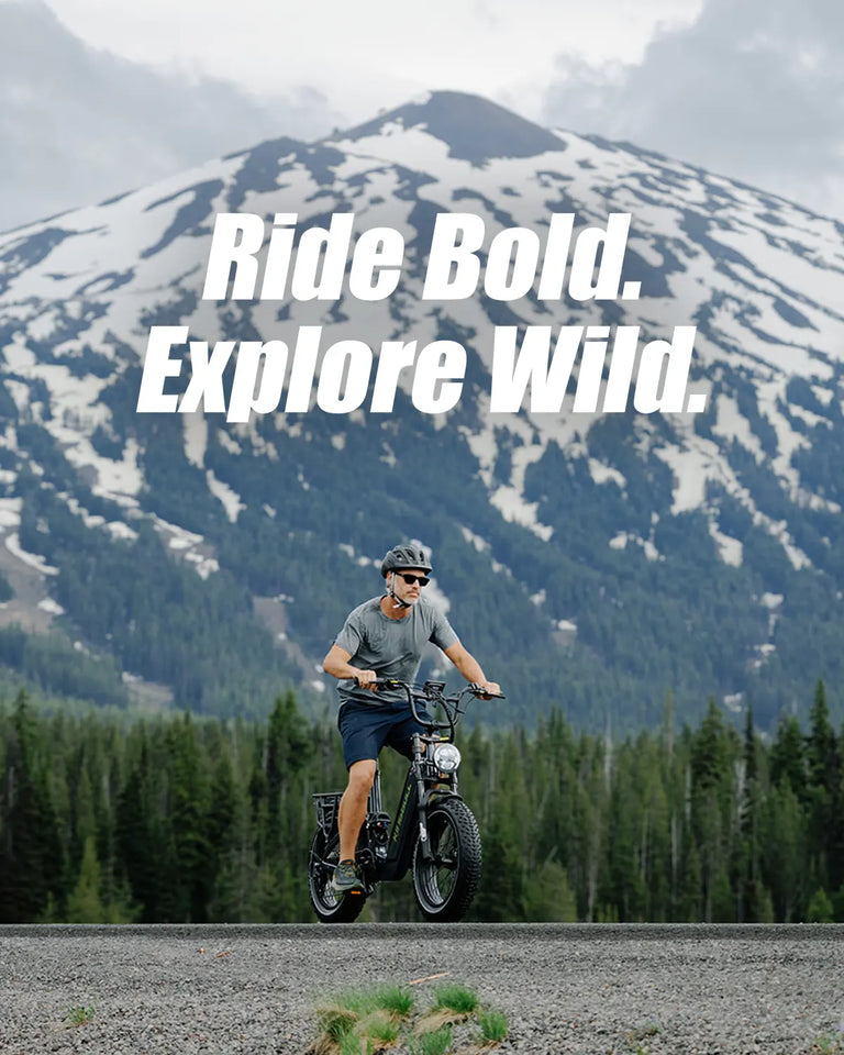 A cool guy riding his Jumper Go 20" Full Suspension All Terrain Electric Bike in the mountains