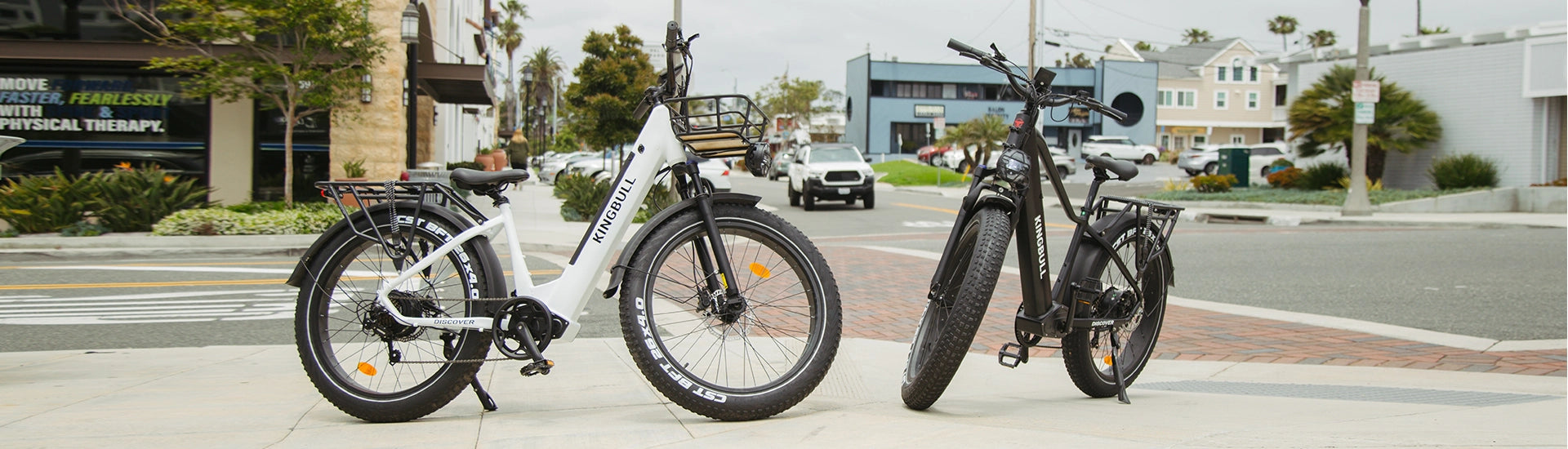 Two Kingbull literider electric bikes parked on the road, the left one is Kingbull Discover ST, the right one is Kingbull Discover