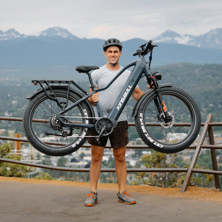 Man raises a kingbull electric bicycle