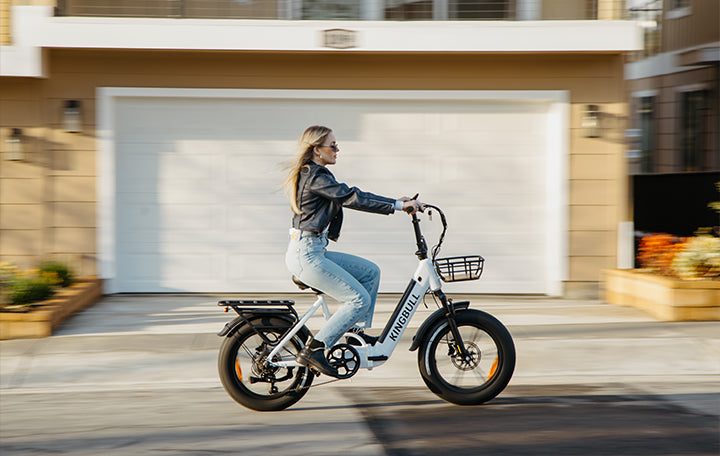 A women rides the Kingbull Literider Folding Ebike on the road