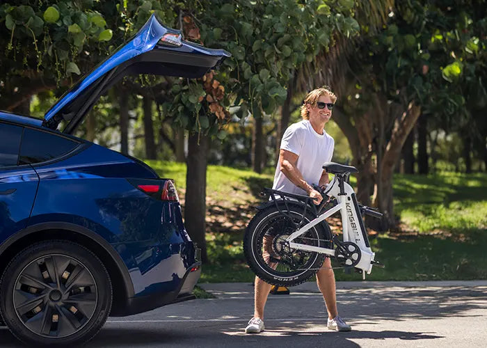 Man takes folding electric bike out of trunk kingbull verve