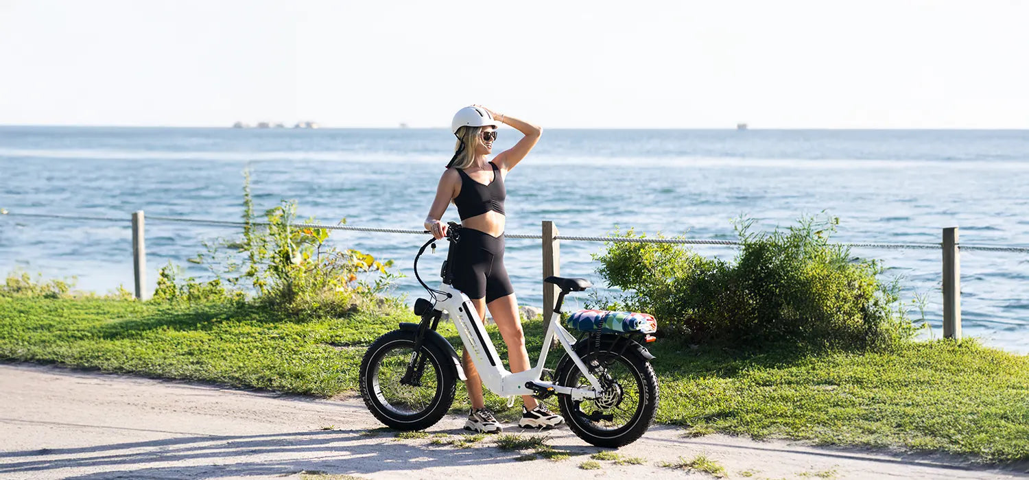 Lady enjoys the sun with her electric bike