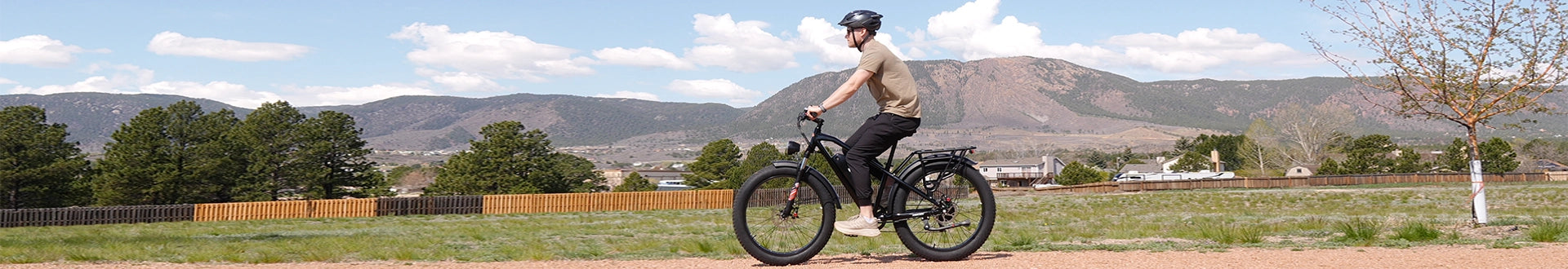 Kingbull Hunter A man rides the Kingbull Hunter Ebike on a country road