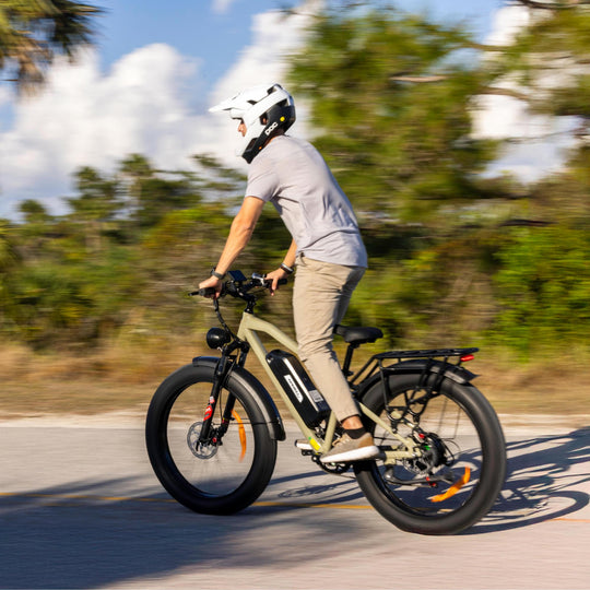 A man cyclist riding Kingbull Hunter 2.0 electric mountain bike on the path