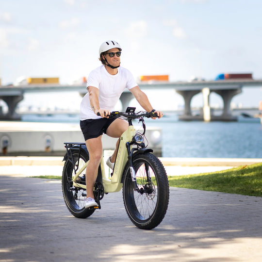A man is riding a kingbull electric bicycle terkker