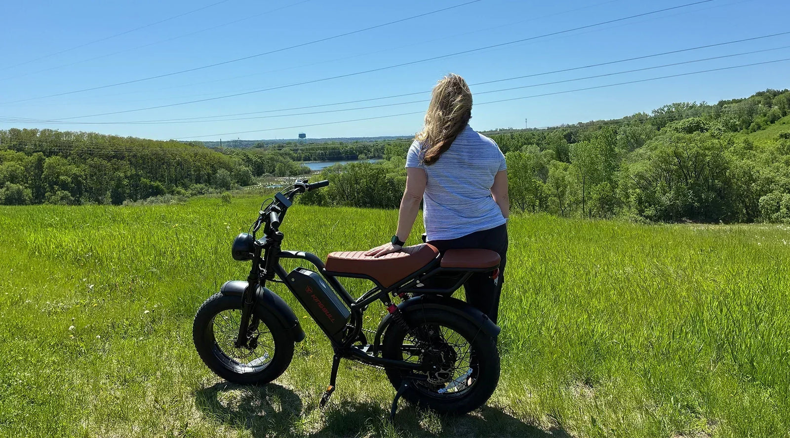 Kingbull Ranger electric bike rider enjoying an outdoor trail ride in nature