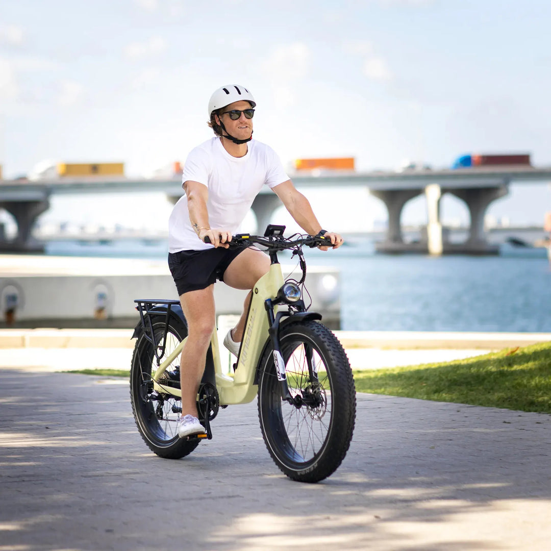A man is showing a rapid turn of the electric bike trekker