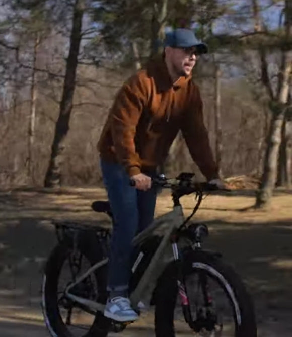 Man standing and riding kingbull electric bicycle Hunter 2.0