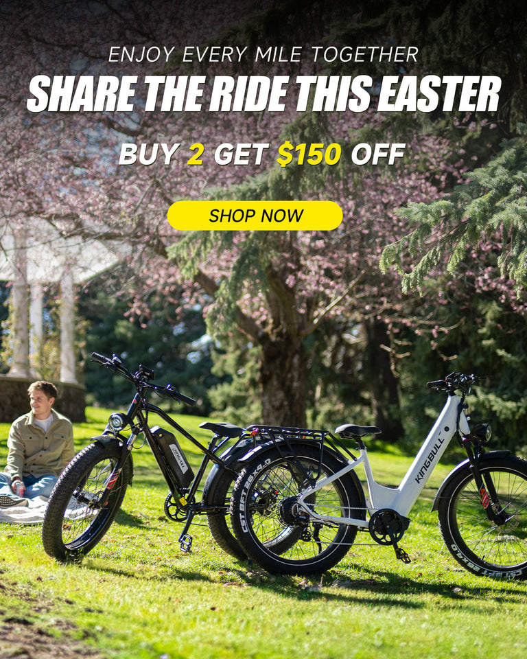 Black Kingbull hunter 2.0 off-road e-bike and white kingbull discover st 2.0 city e-bike parked on grass in a sunny park with cherry blossoms, Easter sale promotion offering $150 off when buying 2 bikes