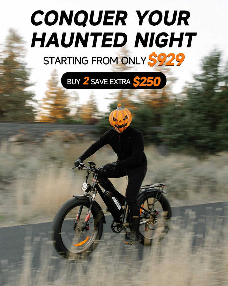 Person with pumpkin head riding Black Kingbull Hunter 2.0 electric bike on autumn trail - Halloween promotion starting at $929, buy 2 save $250