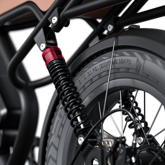 Rear shock absorber installed on the Kingbull Ranger electric bike, showing its position on the bike's rear suspension system.
