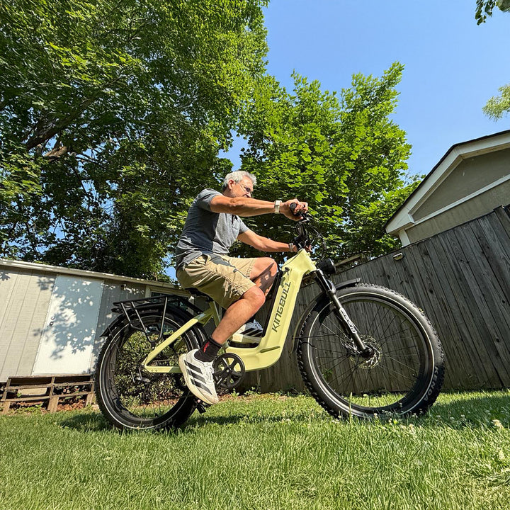 A man riding a kingbull trekker in the garden
