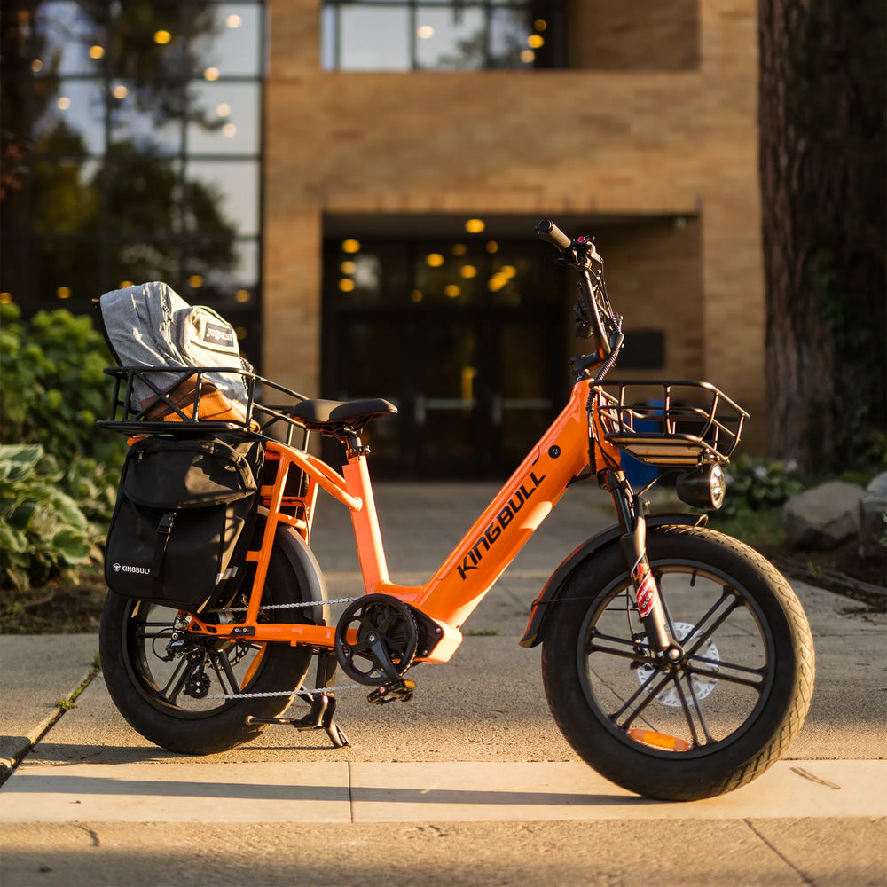 Kingbull Voyager 2.0 Orange electric bike side view with front and rear cargo racks and storage bags