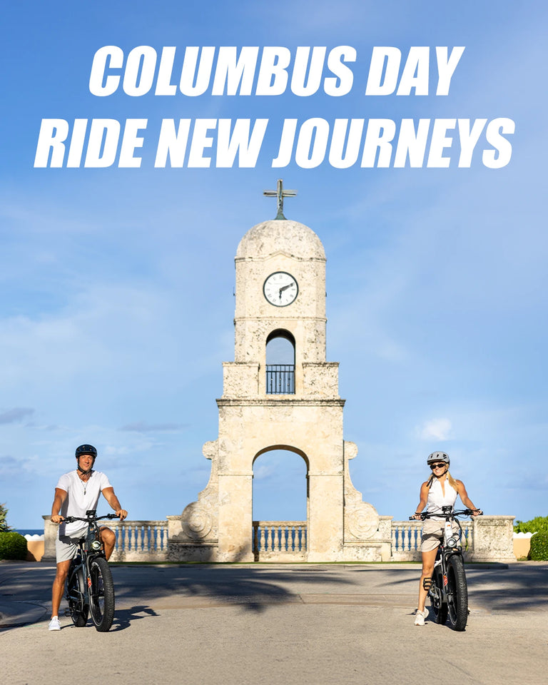 Two riders on Kingbull Disocver 2.0 and Discover ST 2.0 electric bikes at historic monument for Columbus Day Ride New Journeys promotion