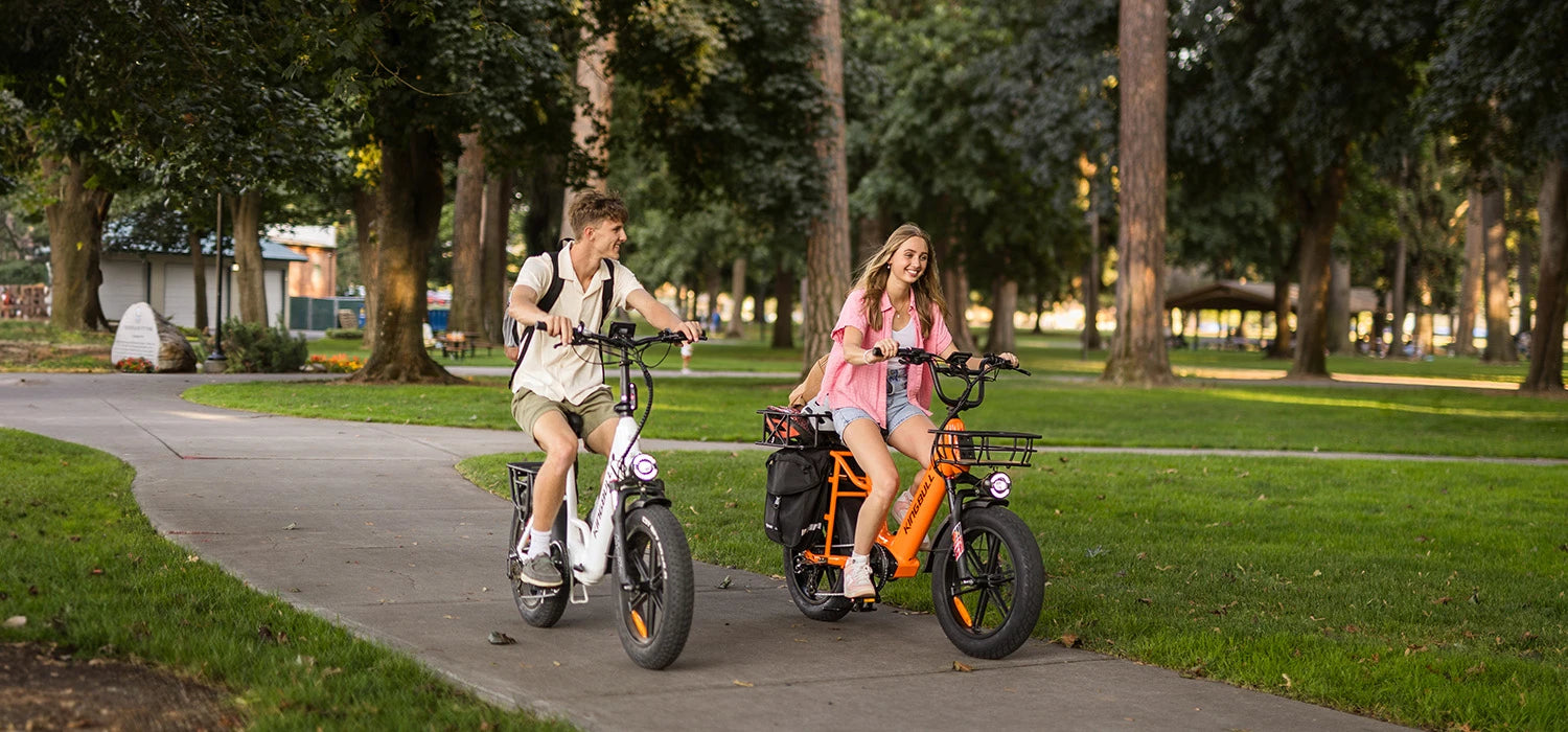 Two students rode their Kingbull e-bikes together on the greenway.